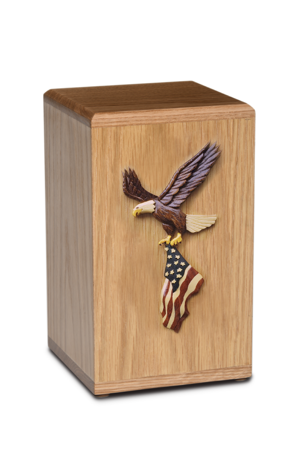 Wooden cremation urn with eagle holding American flag