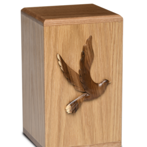 Wooden cremation urn with flying dove