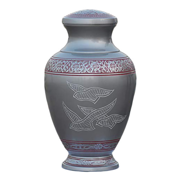 Silver cremation urn with doves and red accents