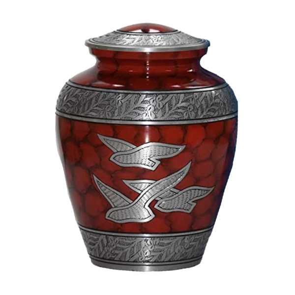 Red cremation urn with doves and silver accents